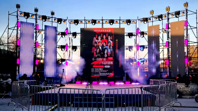 Outdoor festival stage with a rental LED screen